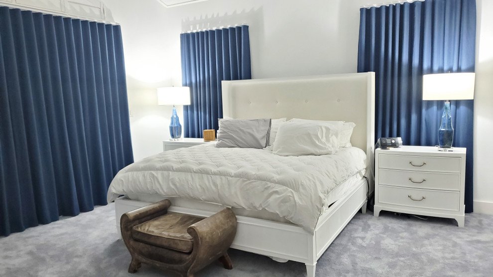 Inspiration for a beach style master bedroom in Miami.