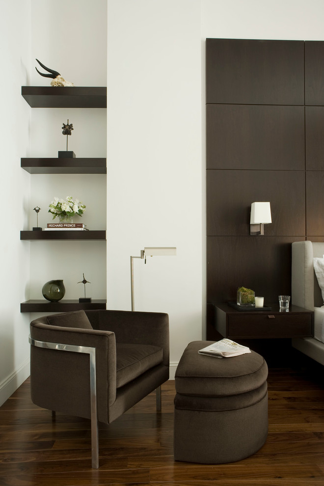 Inspiration for a contemporary bedroom in New York with white walls and dark hardwood floors.