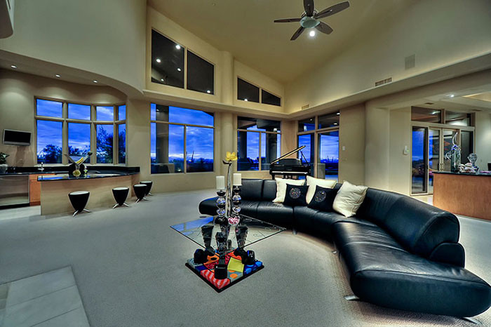 Huge transitional home design photo in Phoenix