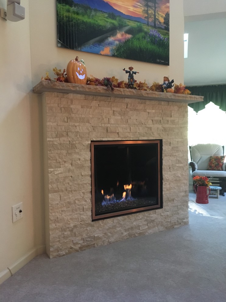 Mid-sized transitional open concept carpeted home design photo with beige walls, a standard fireplace and a stone fireplace