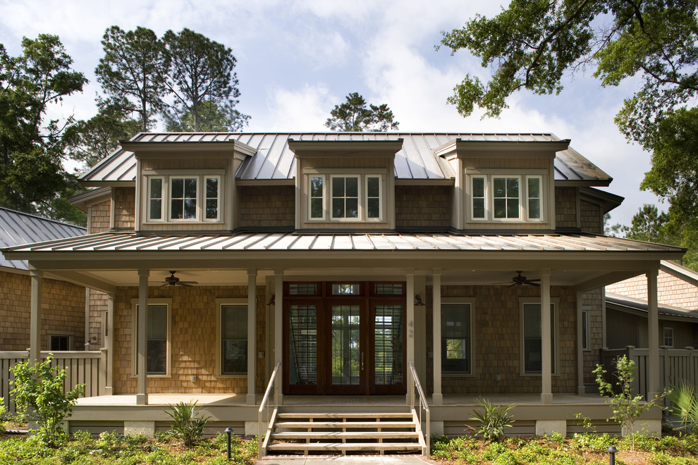 This is an example of a traditional exterior in Atlanta with wood siding.