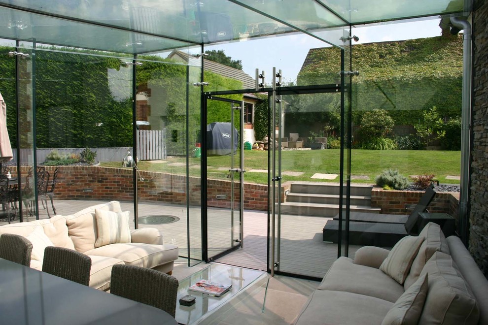 Photo of a contemporary sunroom in Wiltshire.