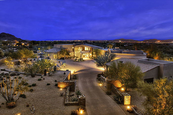 Inspiration for a huge transitional concrete floor front door remodel in Phoenix with beige walls and a glass front door
