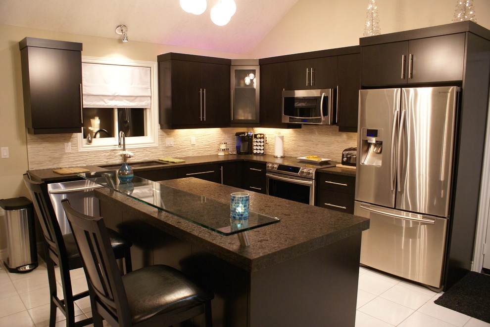 Example of a mid-sized transitional eat-in kitchen design with recessed-panel cabinets, dark wood cabinets, laminate countertops, white backsplash, stainless steel appliances and an island