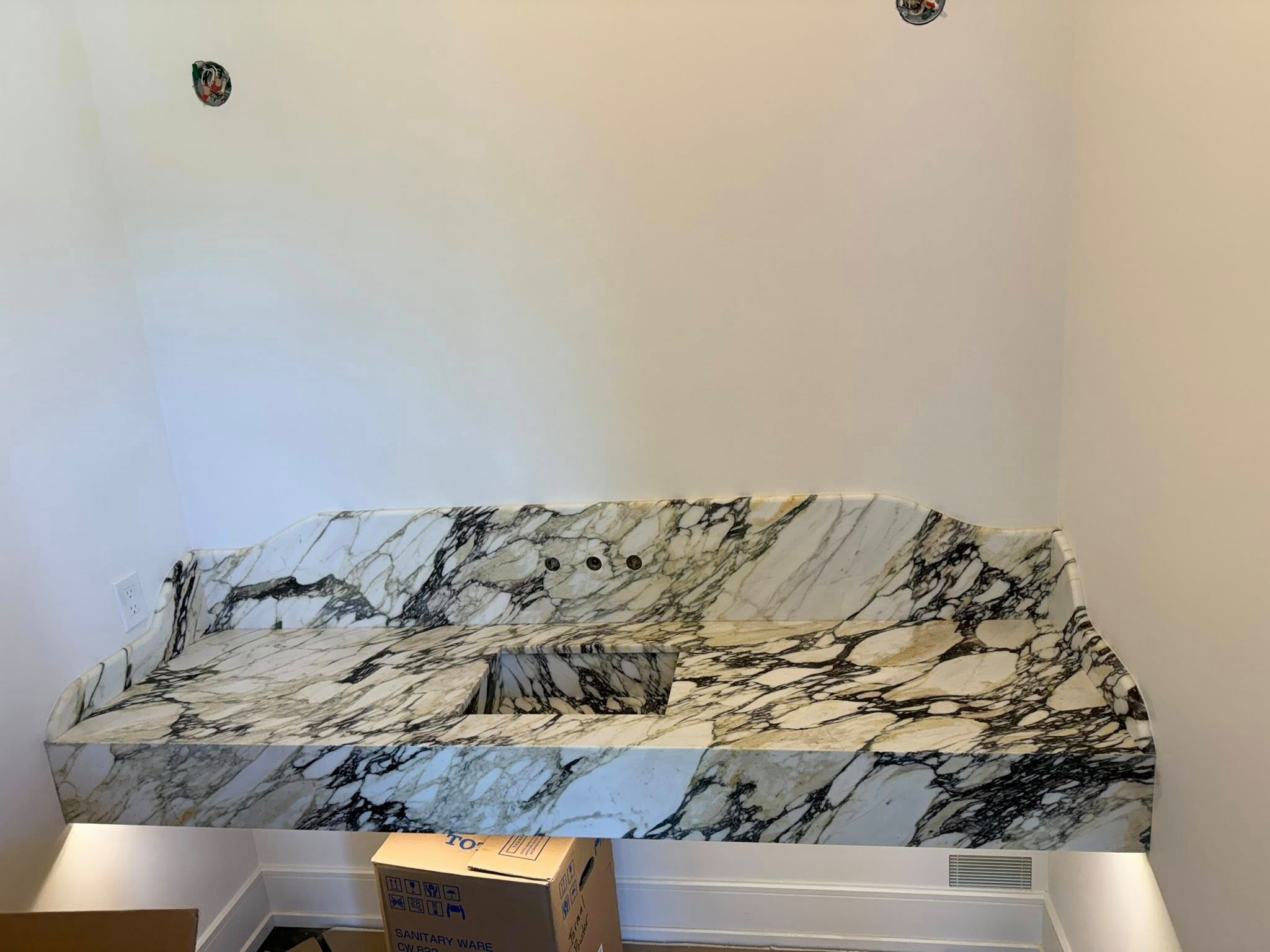 Floating vein matched marble top