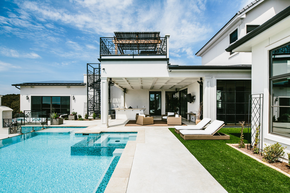 Photo of a contemporary backyard pool in Austin.
