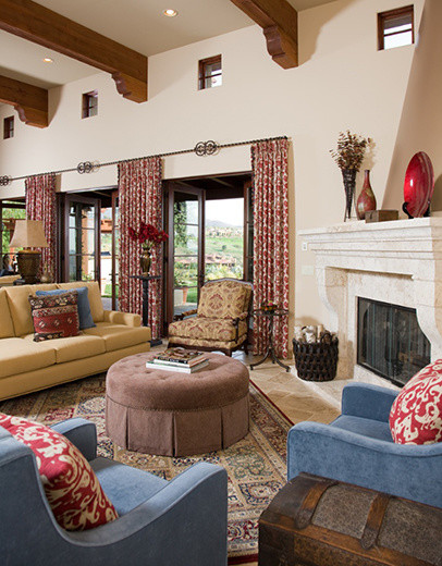 Design ideas for a mid-sized mediterranean open concept family room in San Francisco with beige walls, ceramic floors, a standard fireplace and a stone fireplace surround.