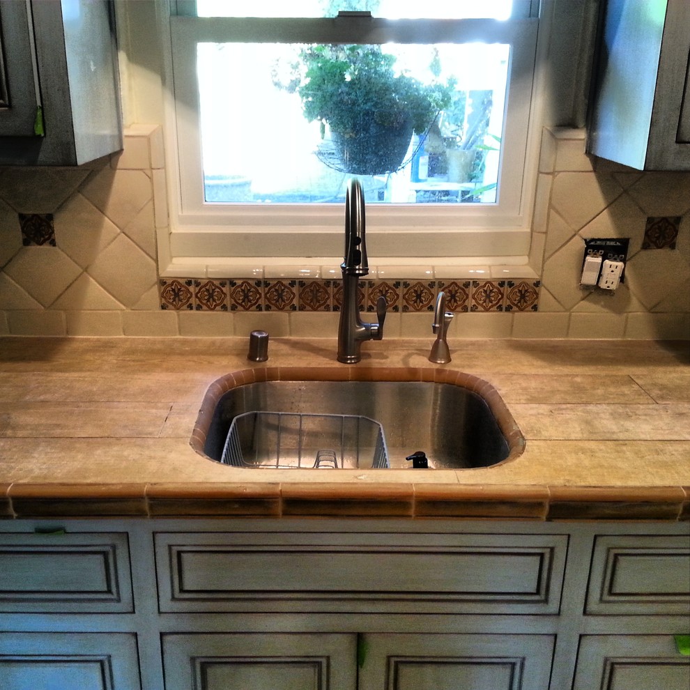 Inspiration for a rustic kitchen remodel in Orange County