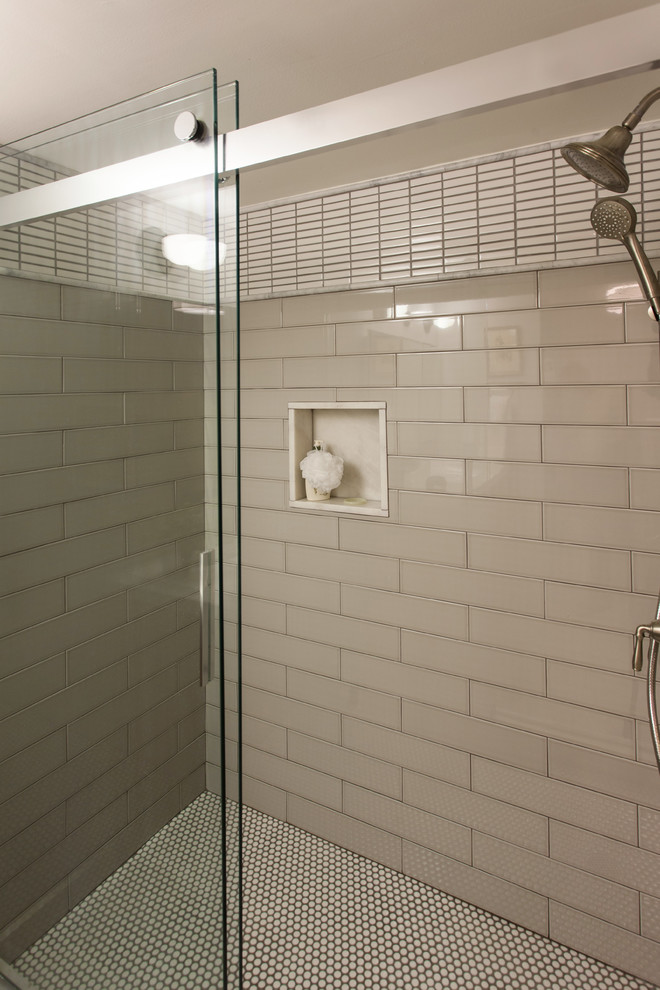 This is an example of a small transitional 3/4 bathroom in Other with recessed-panel cabinets, medium wood cabinets, an alcove shower, a two-piece toilet, white tile, ceramic tile, beige walls, dark hardwood floors, a wall-mount sink, solid surface benchtops, beige floor and a shower curtain.