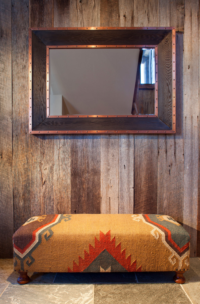 Inspiration for a rustic entryway remodel in Denver