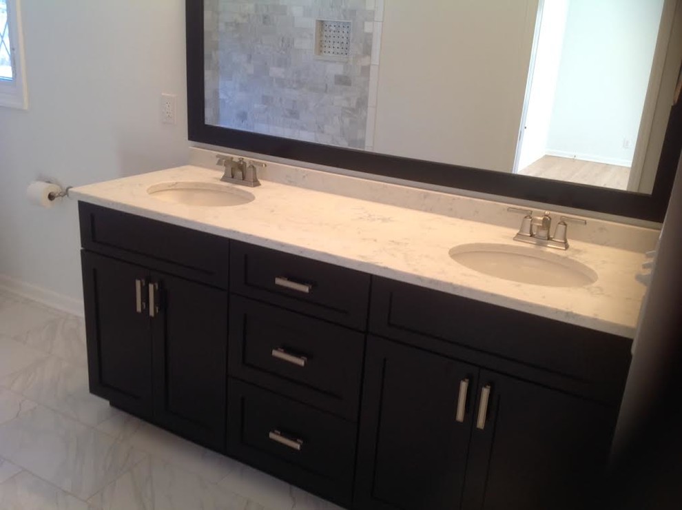 Mid-sized contemporary bathroom in Indianapolis with shaker cabinets, dark wood cabinets, grey walls, marble floors, an undermount sink, marble benchtops and grey floor.