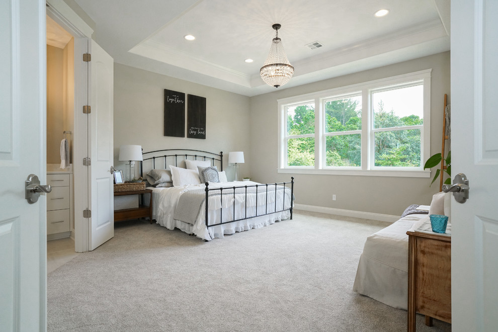 Design ideas for a mid-sized transitional master bedroom in Portland with grey walls, carpet, no fireplace and beige floor.