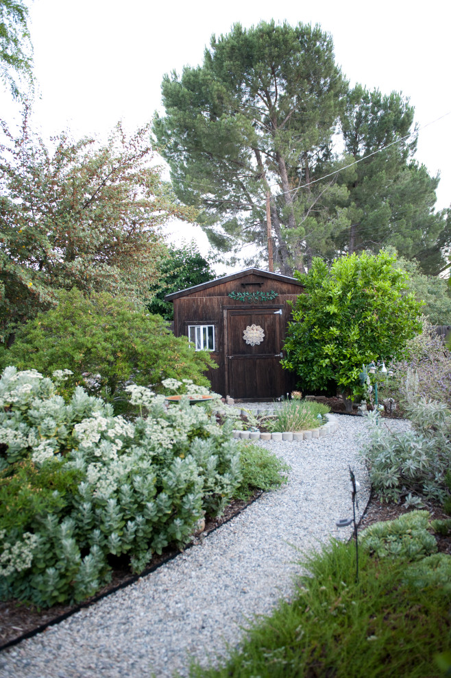 Inspiration for a large eclectic drought-tolerant and full sun backyard gravel vegetable garden landscape in Los Angeles for spring.