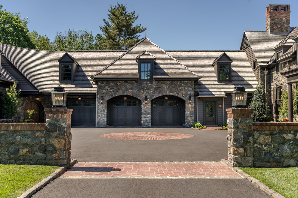 Design ideas for a large traditional attached two-car garage in Philadelphia.