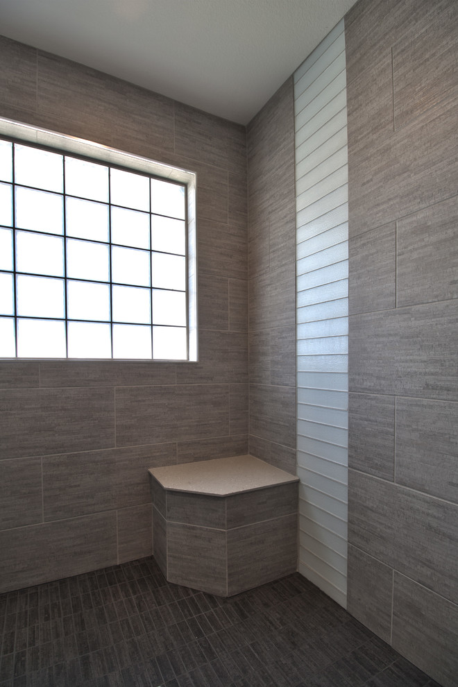 Large contemporary master bathroom in Other with beaded inset cabinets, white cabinets, gray tile, grey walls, porcelain floors, a corner shower, glass tile and grey floor.
