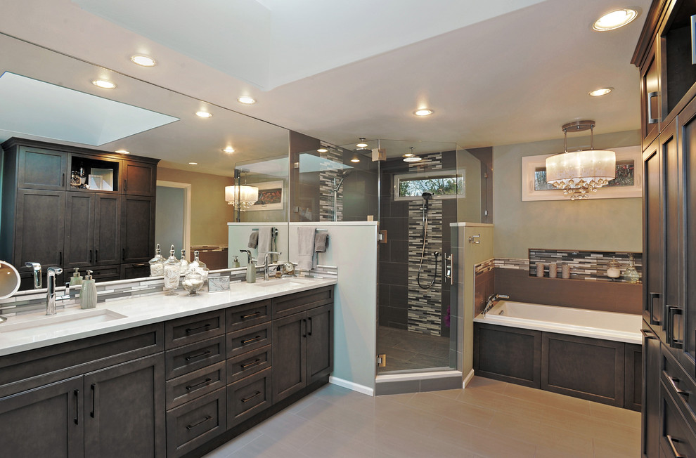 Inspiration for a large transitional master bathroom in Seattle with an undermount sink, shaker cabinets, brown cabinets, engineered quartz benchtops, a drop-in tub, a double shower, a one-piece toilet, gray tile, ceramic tile, green walls and ceramic floors.