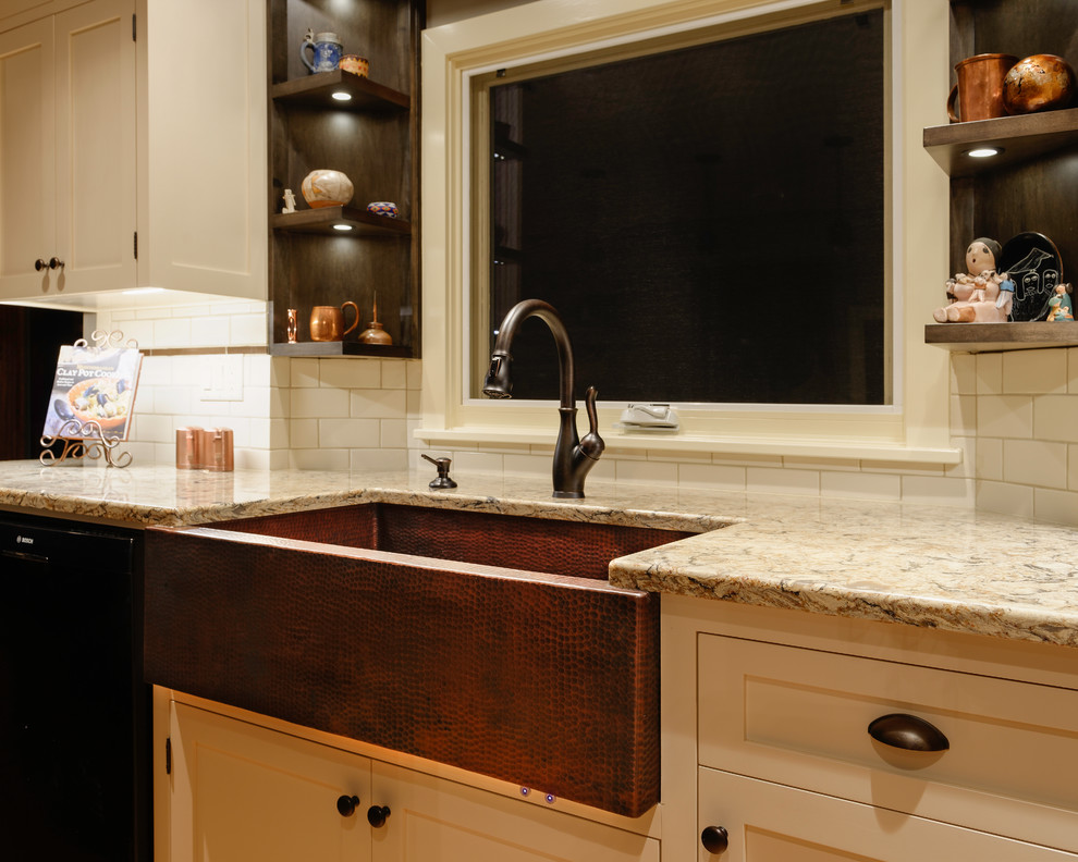 This is an example of a small traditional kitchen in Seattle with shaker cabinets.