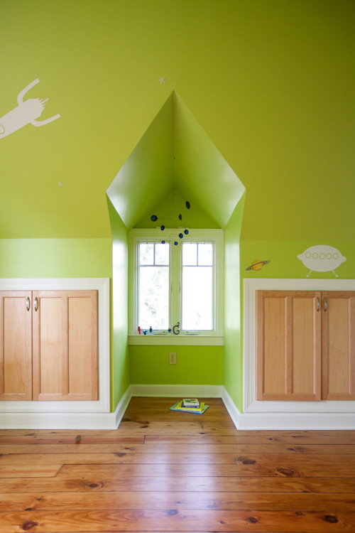 brightly colored room with built in cabinets