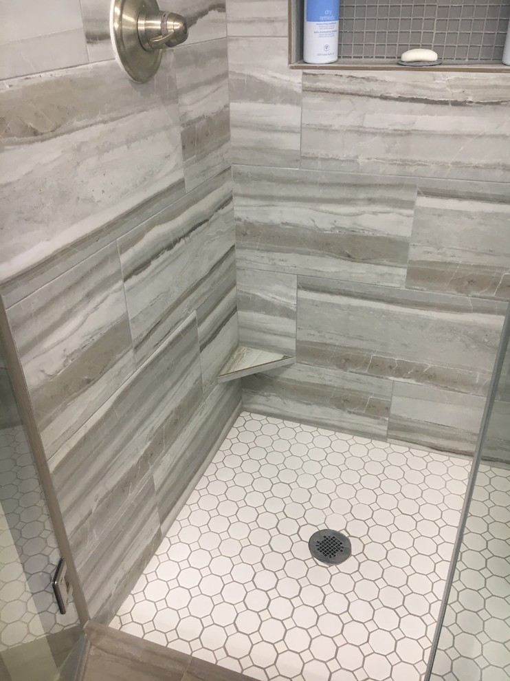 Example of a transitional home design design in Houston