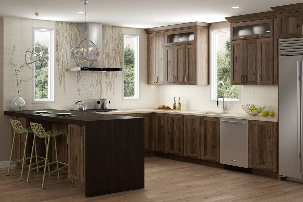 Open concept kitchen - large transitional u-shaped light wood floor and brown floor open concept kitchen idea in Minneapolis with an undermount sink, flat-panel cabinets, medium tone wood cabinets, quartzite countertops, multicolored backsplash, mosaic tile backsplash, stainless steel appliances, a peninsula and multicolored countertops