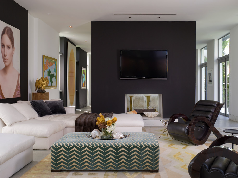 Design ideas for a contemporary living room in Miami with a two-sided fireplace.