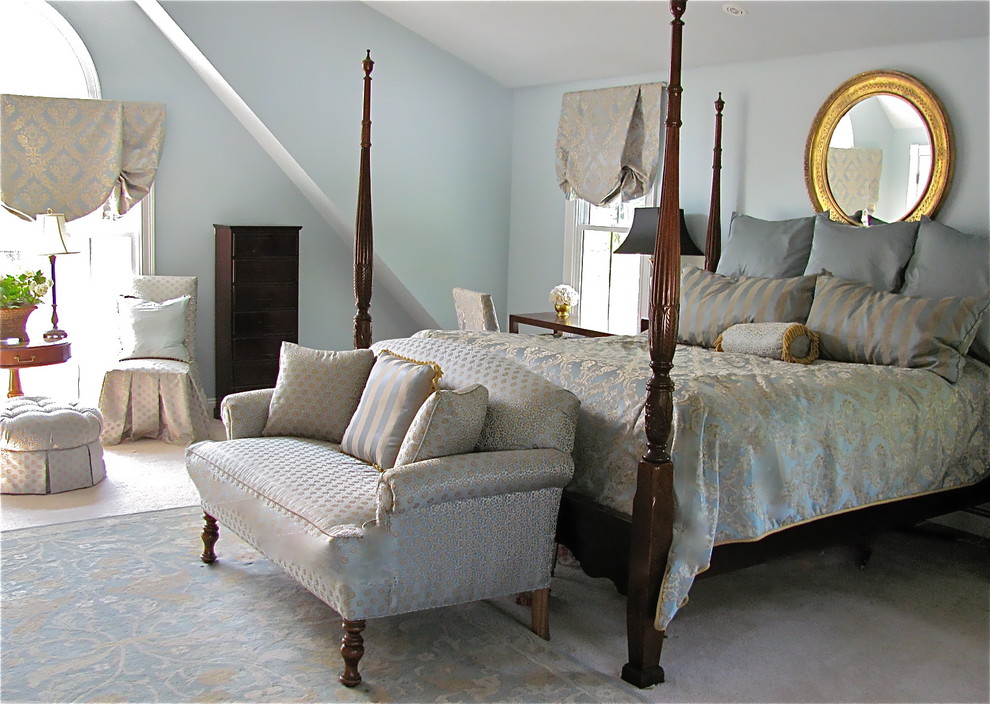 Traditional bedroom in Boston with blue walls.