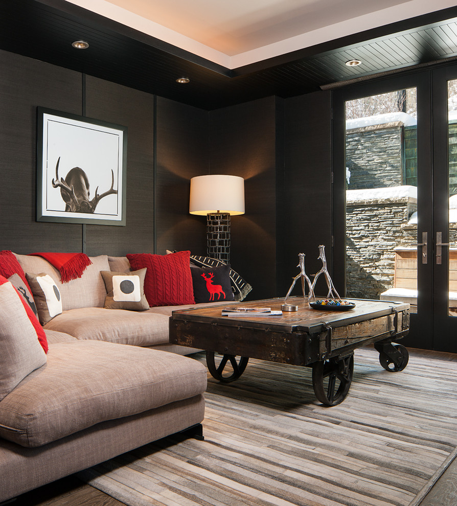 Inspiration for a mid-sized country family room in Salt Lake City with black walls.