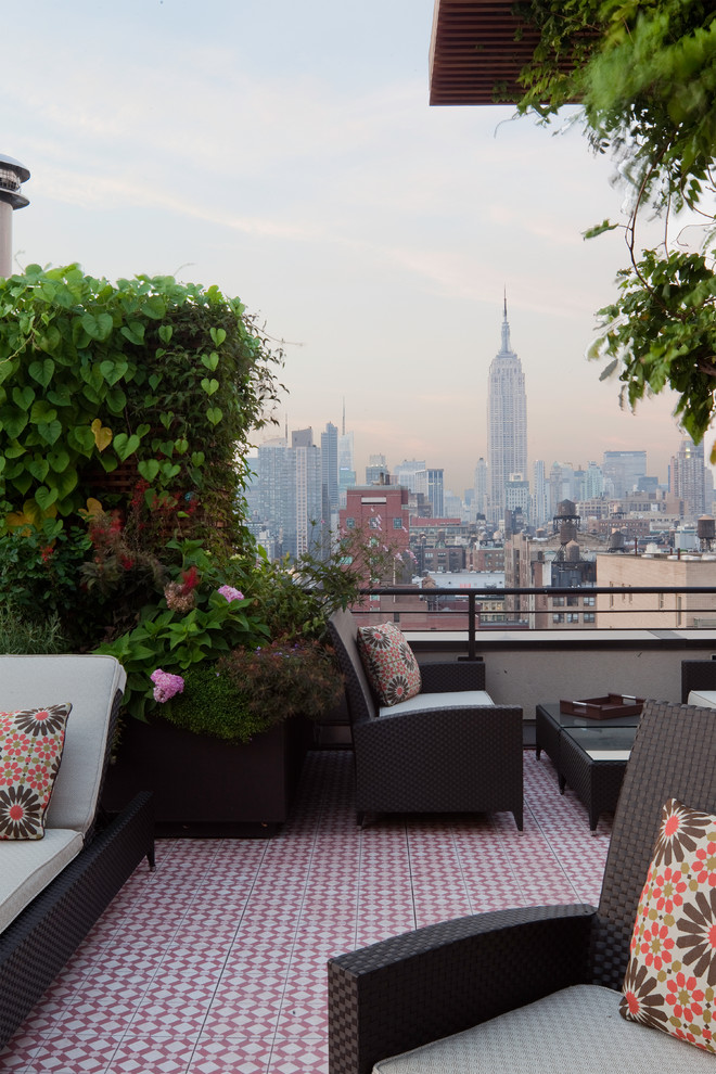 Inspiration for a contemporary rooftop and rooftop deck in New York with no cover and a container garden.