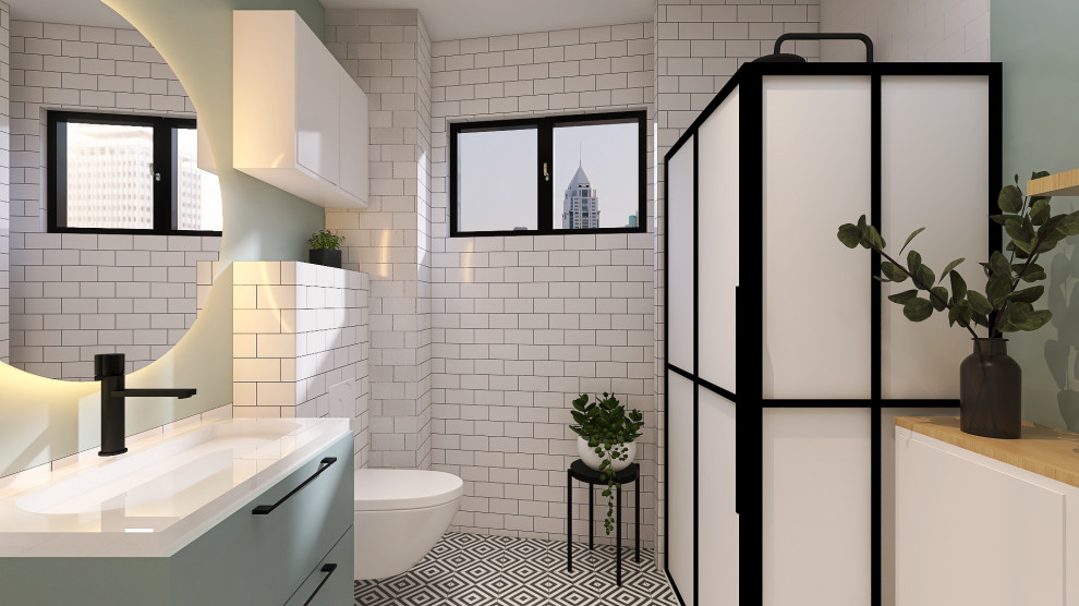 Example of a mid-sized urban 3/4 white tile and subway tile black floor and single-sink bathroom design in Other with white cabinets, a wall-mount toilet, green walls and a wall-mount sink