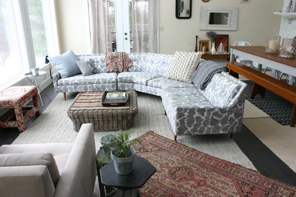 This is an example of an eclectic open concept living room in Chicago.