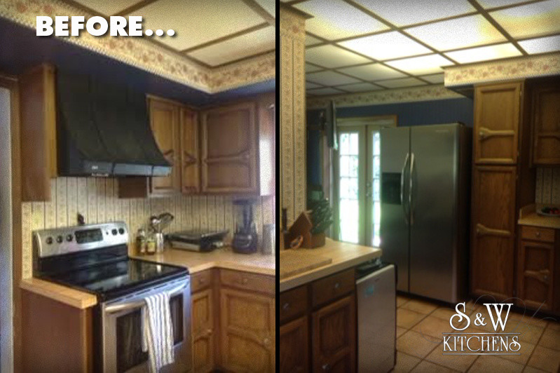 Kitchen - rustic kitchen idea with raised-panel cabinets, distressed cabinets, granite countertops and stone tile backsplash