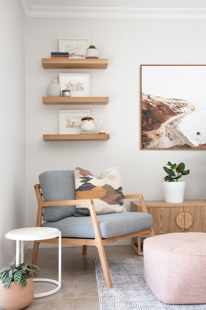 Photo of a contemporary formal open concept living room in Sydney with white walls, porcelain floors, no fireplace and no tv.