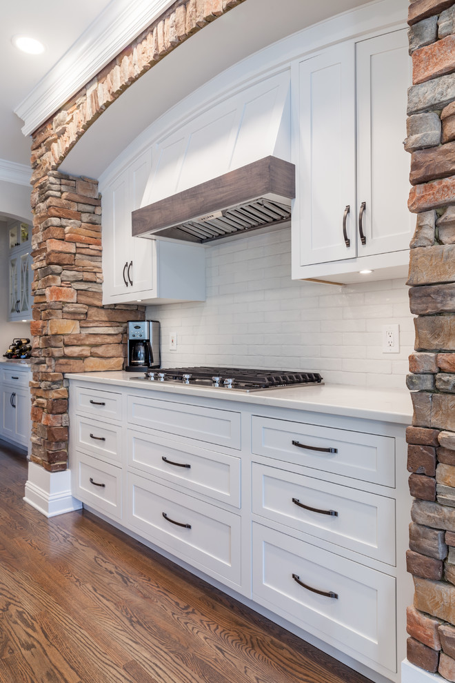 Transitional Kitchen with Natural Rock Wall
