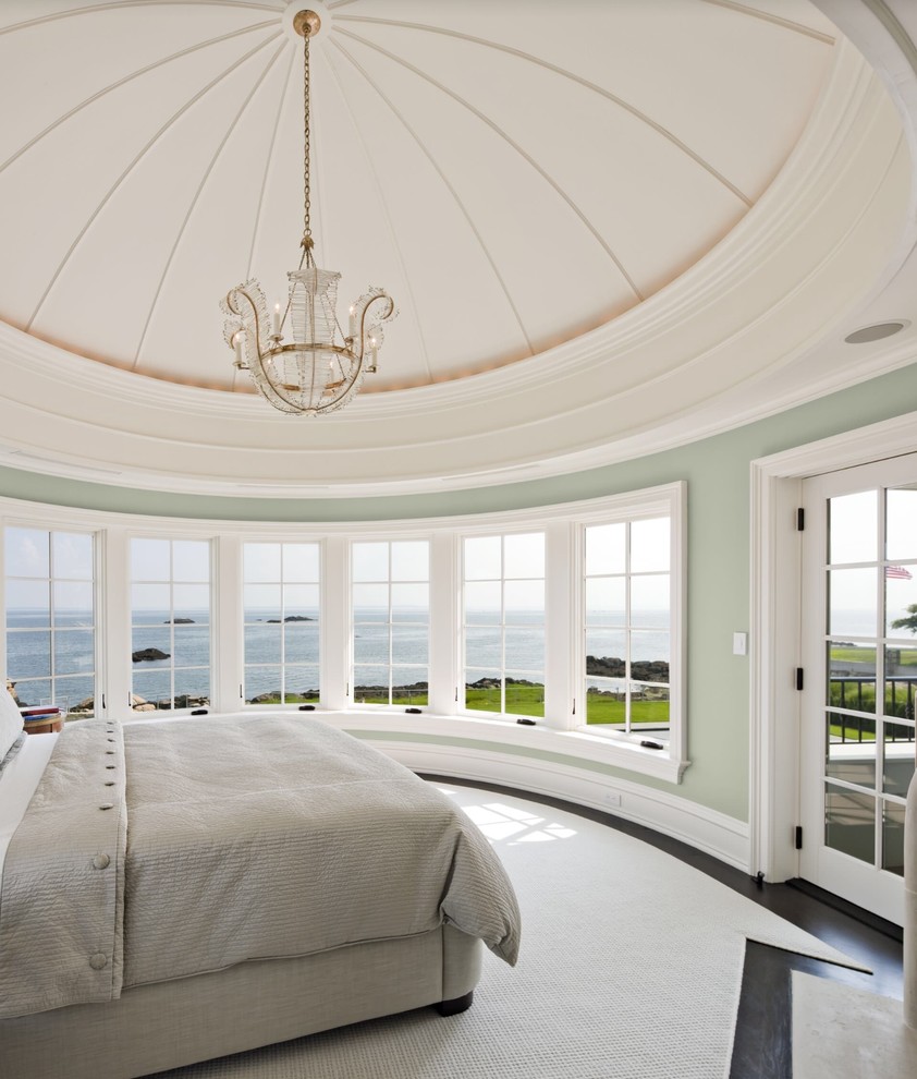 Inspiration for a beach style master bedroom in Boston with multi-coloured walls.