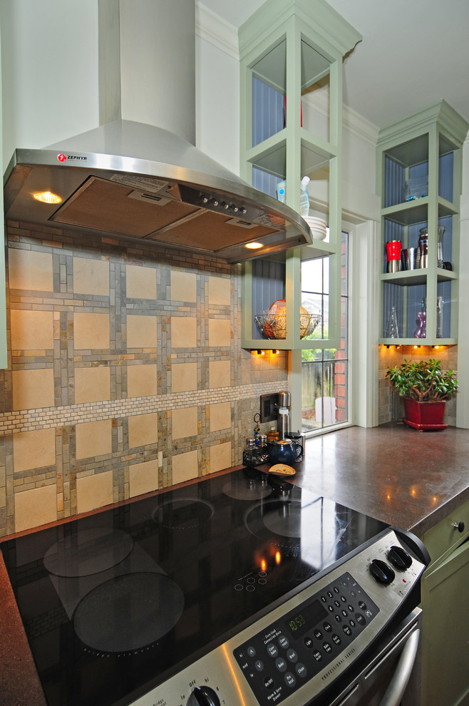 Inspiration for a mid-sized transitional u-shaped dark wood floor kitchen pantry remodel in Seattle with a farmhouse sink, shaker cabinets, green cabinets, concrete countertops, green backsplash, stone tile backsplash, stainless steel appliances, gray walls and an island