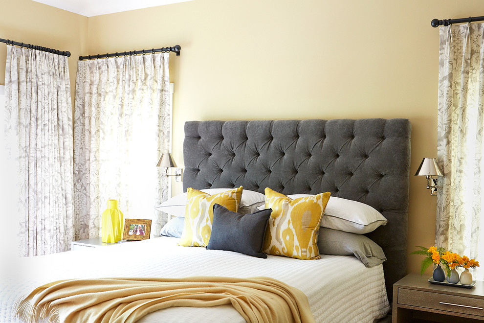 Mid-sized transitional master bedroom in San Francisco with yellow walls.