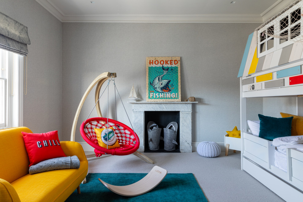 Large contemporary children’s room for boys in London with grey walls, carpet, grey floors, a coffered ceiling and wallpapered walls.