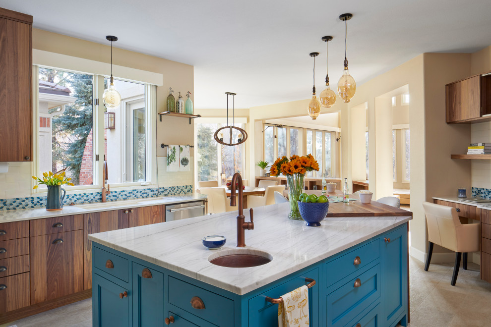 Example of a mid-sized transitional u-shaped porcelain tile and white floor eat-in kitchen design in Denver with a double-bowl sink, flat-panel cabinets, medium tone wood cabinets, quartzite countertops, multicolored backsplash, ceramic backsplash, stainless steel appliances, an island and white countertops