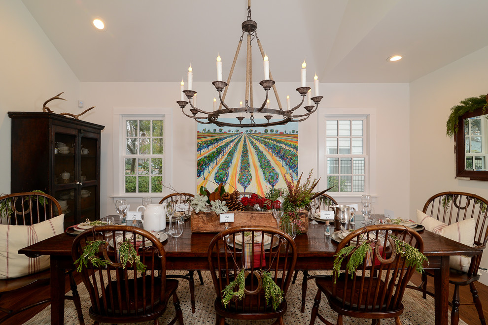 Design ideas for a mid-sized country dining room in Sacramento with white walls and medium hardwood floors.