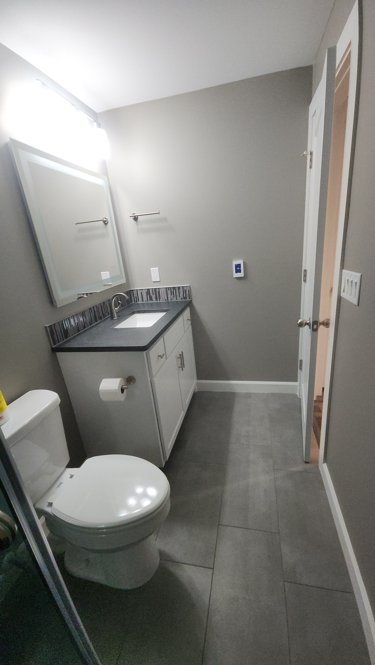 Complete Basement Remodel with Custom Built-Ins & Onyx Shower | Wichita, KS