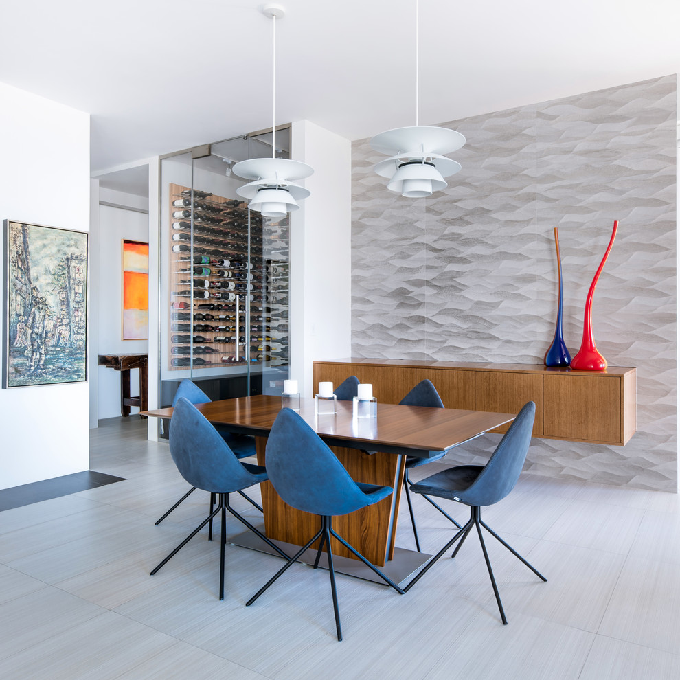 This is an example of a mid-sized contemporary dining room in Dallas with porcelain floors, no fireplace, grey floor and grey walls.