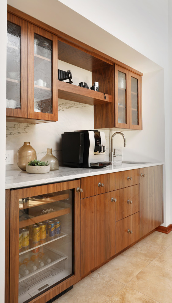 Design ideas for a small midcentury single-wall eat-in kitchen in Chicago with an undermount sink, flat-panel cabinets, medium wood cabinets, quartzite benchtops, white splashback, stone slab splashback, panelled appliances, travertine floors, beige floor and white benchtop.