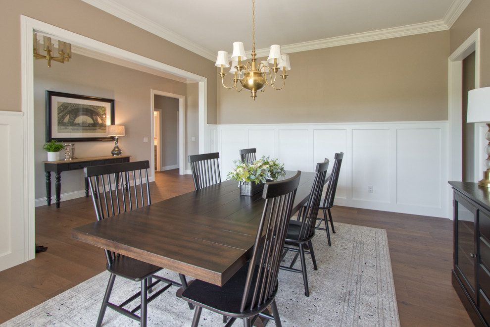 Design ideas for a classic dining room in Other with beige walls, medium hardwood flooring, brown floors and wainscoting.