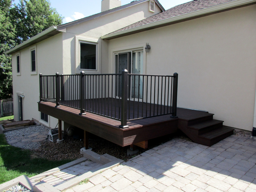 Example of a mid-sized backyard deck design in Denver