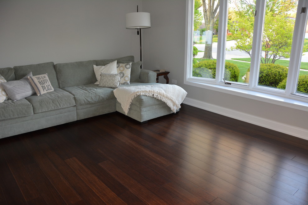 Inspiration for a living room in Baltimore with bamboo floors and brown floor.