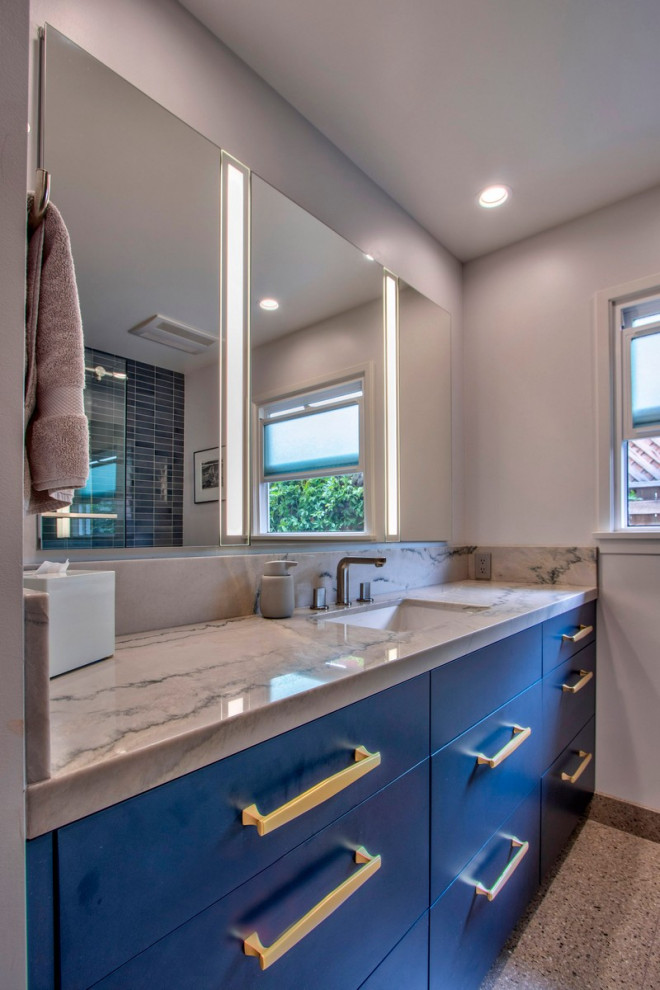 Design ideas for a small midcentury bathroom in San Diego with flat-panel cabinets, blue cabinets, a corner bath, a corner shower, blue tiles, terrazzo flooring, a submerged sink, quartz worktops, a sliding door, white worktops, a single sink and a built in vanity unit.