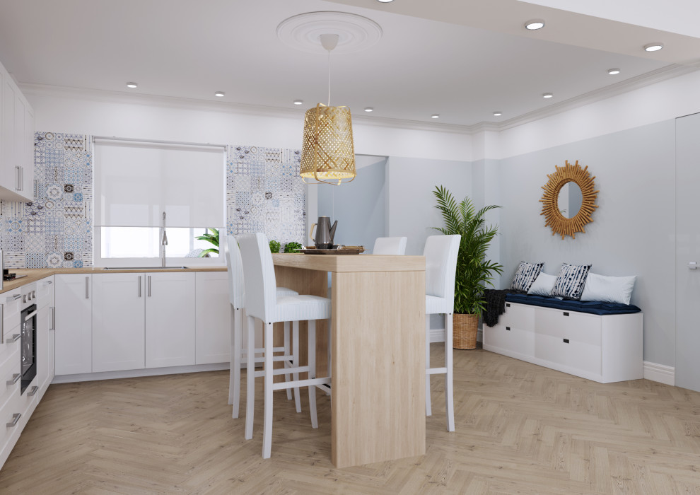 This is an example of a small scandi l-shaped open plan kitchen in Other with beaded cabinets, white cabinets, wood worktops, multi-coloured splashback, mosaic tiled splashback, light hardwood flooring, beige floors and beige worktops.