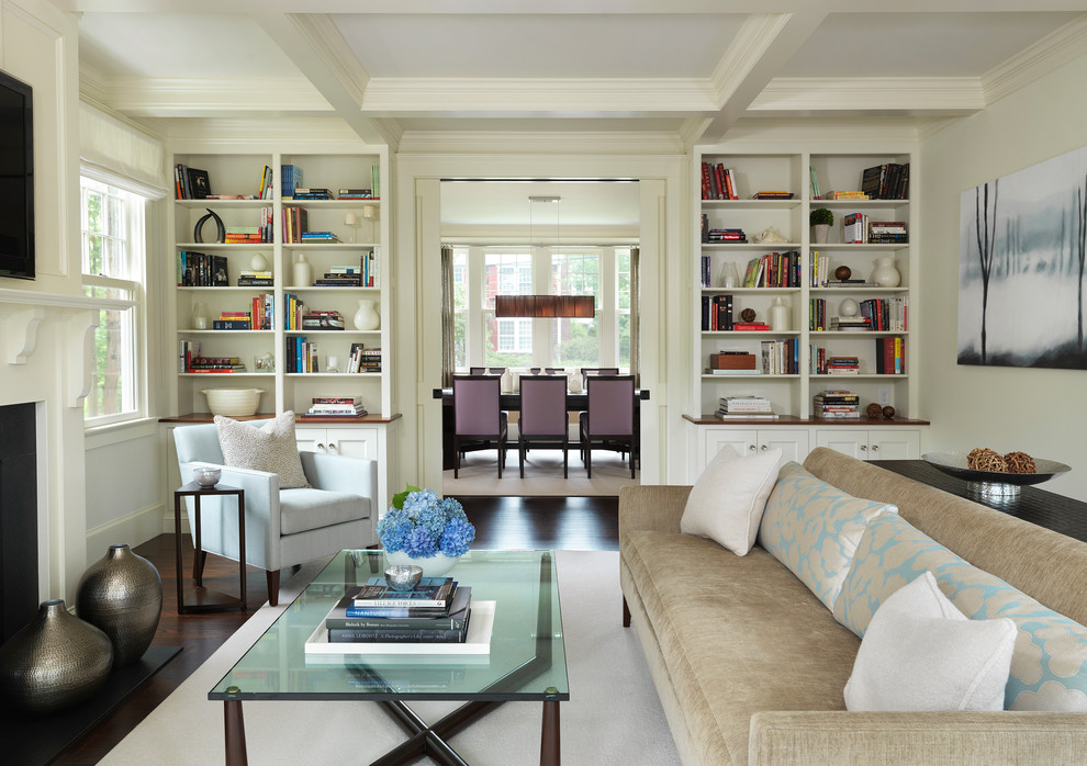 Inspiration for a traditional enclosed living room in Boston with a library.