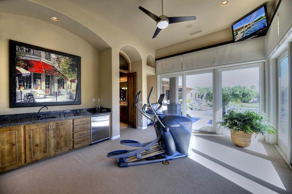 This is an example of a large transitional multipurpose gym in Phoenix with carpet.