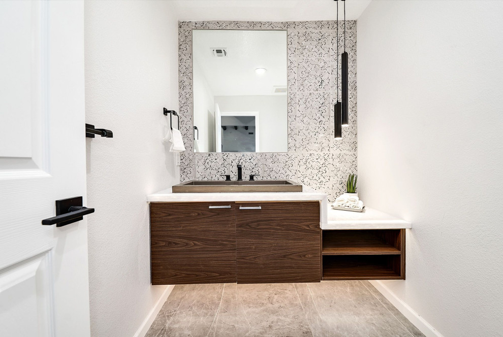 This is an example of a medium sized traditional shower room bathroom in Phoenix with flat-panel cabinets, brown cabinets, porcelain tiles, white walls, porcelain flooring, a vessel sink, engineered stone worktops, grey floors, white worktops, a single sink and a floating vanity unit.
